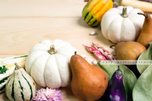Pumpkins & Gourds on Wooden Table