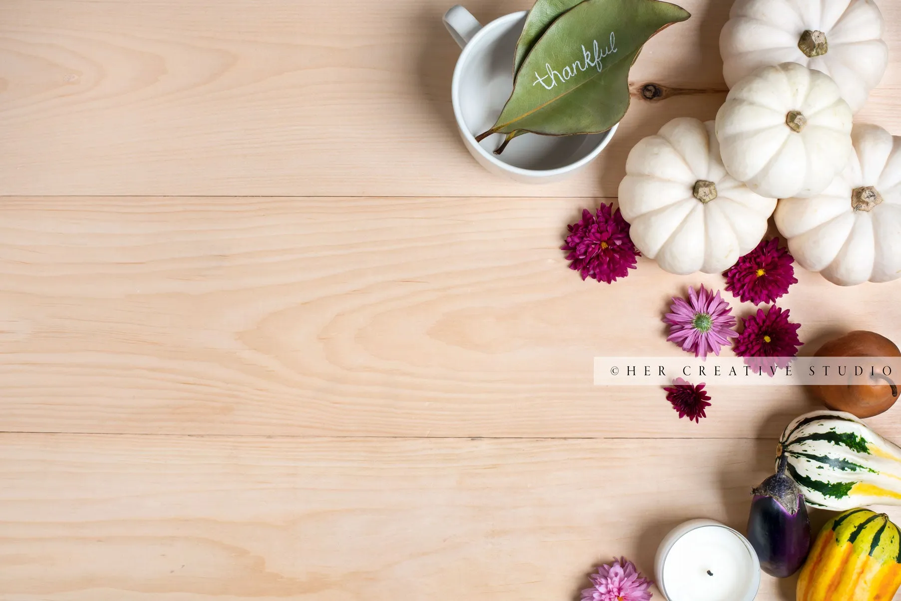 Pumpkins, Gourds & Magnolia on Wooden Table